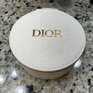 Dior zip jewelry case with mirror.